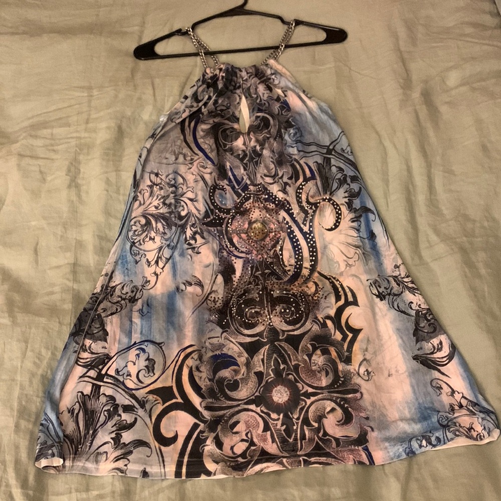 Satin, edgy, date night dress . Keyhole cutouts front and back .